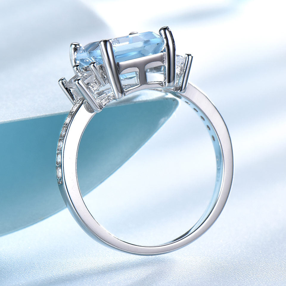 Sea blue topaz ring set with diamond 615734076005